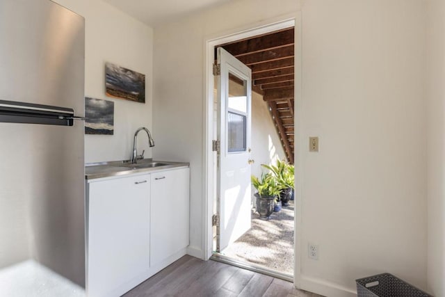 interior space with sink and light hardwood / wood-style floors