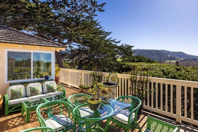 deck featuring a mountain view