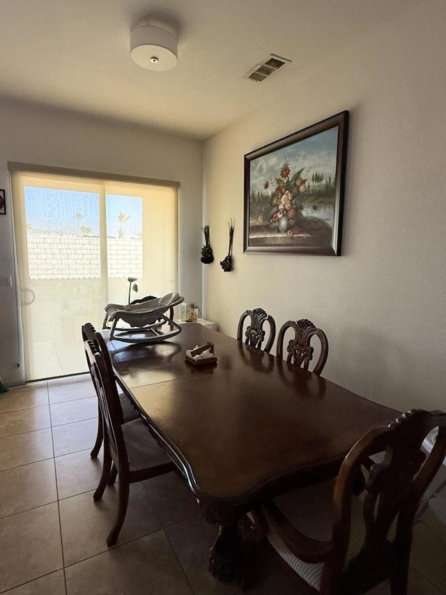 view of tiled dining area