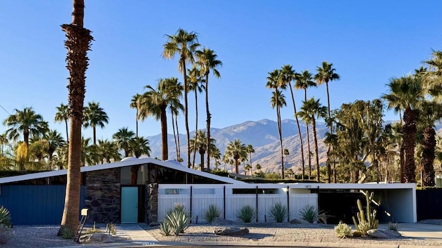 view of front of house featuring a carport and a mountain view