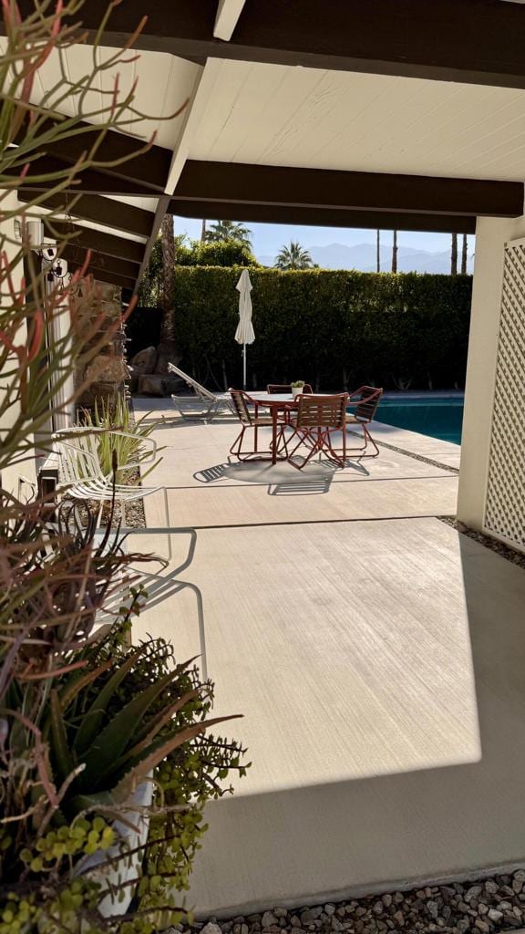 view of patio featuring a community pool