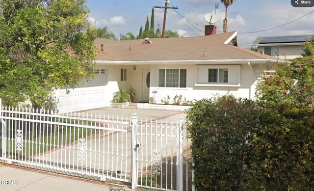 view of front of house with a garage