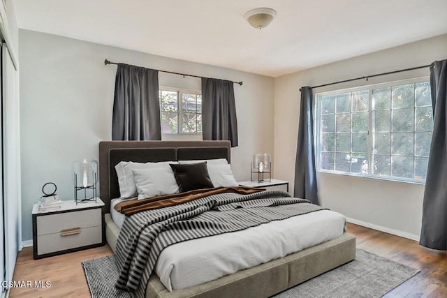 bedroom featuring light hardwood / wood-style floors