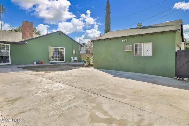 rear view of property with a patio