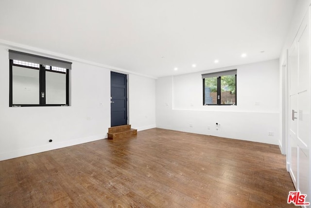 empty room featuring hardwood / wood-style floors