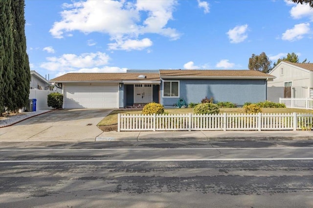 single story home with a garage