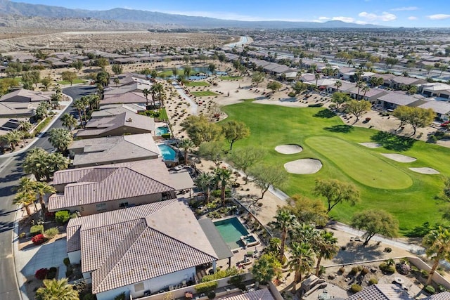 birds eye view of property featuring a mountain view