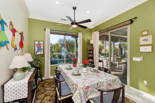 dining area with plenty of natural light, ornamental molding, and ceiling fan