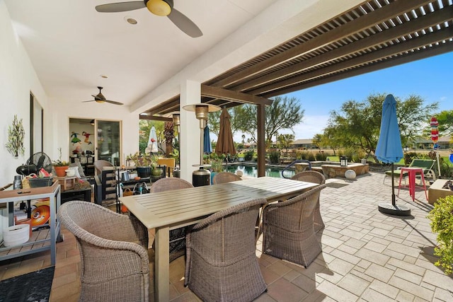 view of patio / terrace featuring ceiling fan