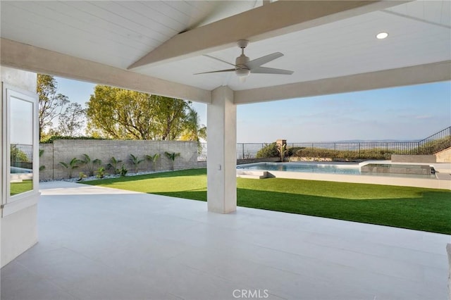 view of patio / terrace featuring ceiling fan