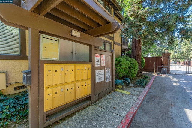 view of side of property with mail boxes