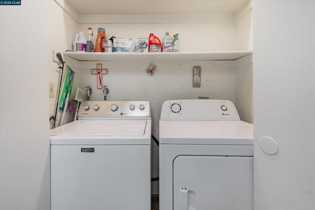 washroom with independent washer and dryer