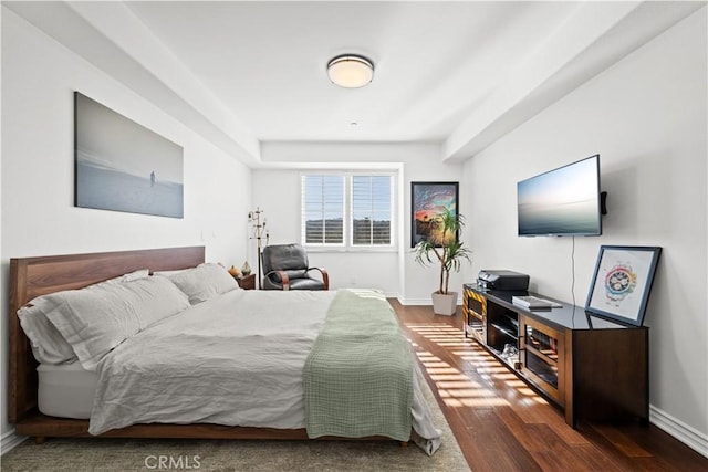 bedroom featuring dark wood-type flooring