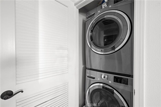 12449 Kling St Unit Ph2, Studio City, CA 91604 - laundry area featuring stacked washer / drying machine