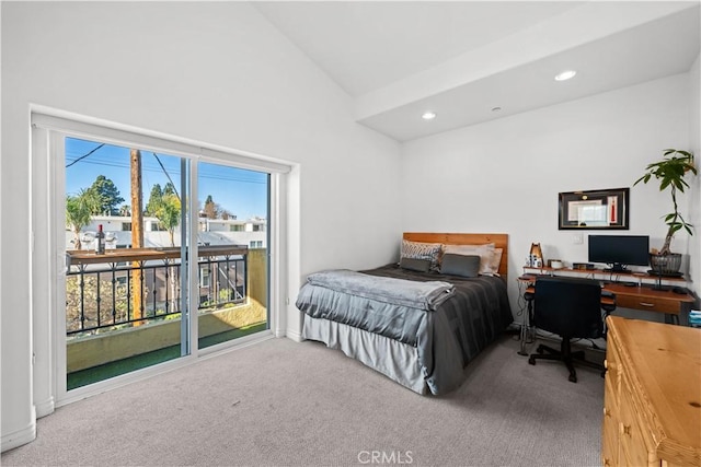 bedroom featuring access to exterior, high vaulted ceiling, and carpet