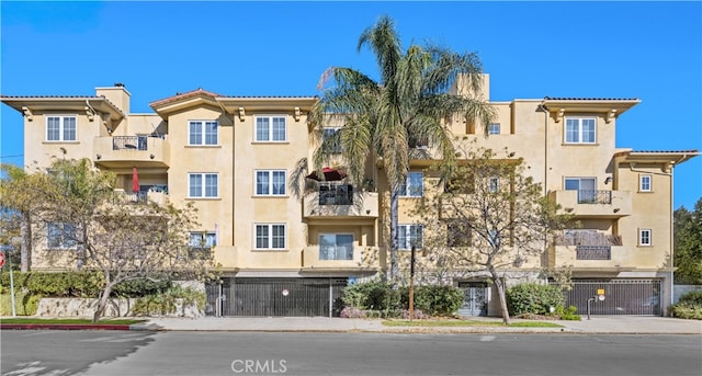 12449 Kling St Unit Ph2, Studio City, CA 91604 - view of apartment building / complex featuring an attached garage