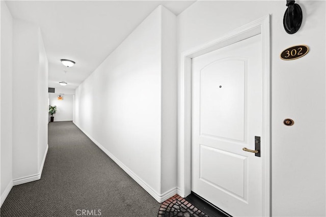 12449 Kling St Unit Ph2, Studio City, CA 91604 - hallway featuring baseboards and dark colored carpet
