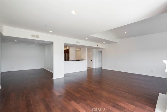 12449 Kling St Unit Ph2, Studio City, CA 91604 - unfurnished living room featuring dark wood-type flooring, recessed lighting, and baseboards