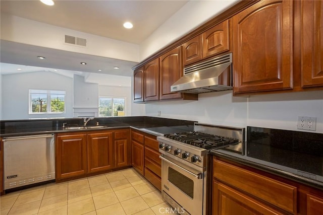 12449 Kling St Unit Ph2, Studio City, CA 91604 - kitchen featuring stainless steel appliances, under cabinet range hood, light tile patterned floors, a sink, and recessed lighting