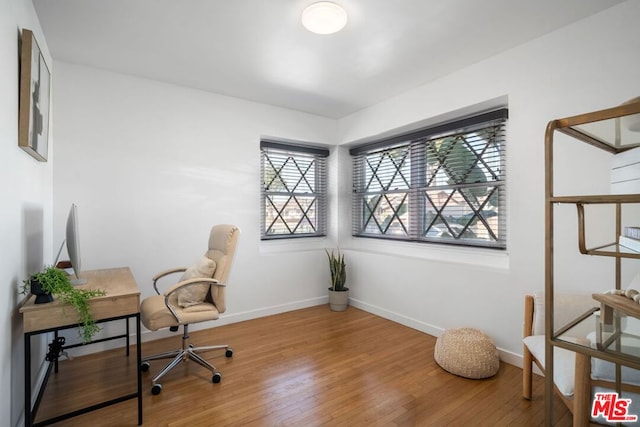 office area with wood-type flooring