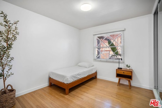 bedroom featuring light hardwood / wood-style flooring