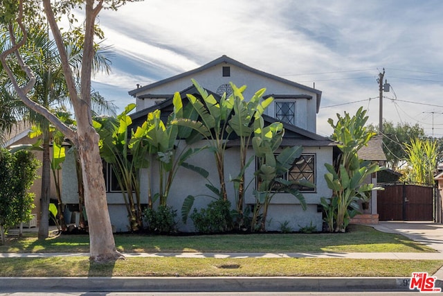 view of home's exterior featuring a yard