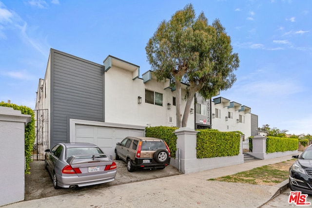 view of front of property featuring a garage