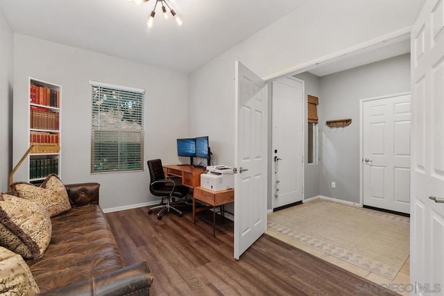 office space with hardwood / wood-style floors