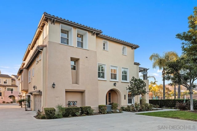 view of front of home with a garage