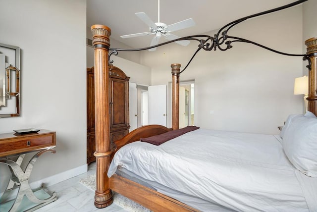 bedroom with ceiling fan and vaulted ceiling