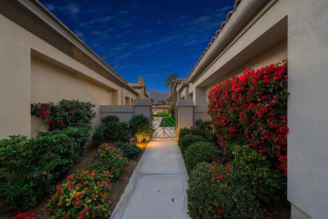 view of property exterior at dusk