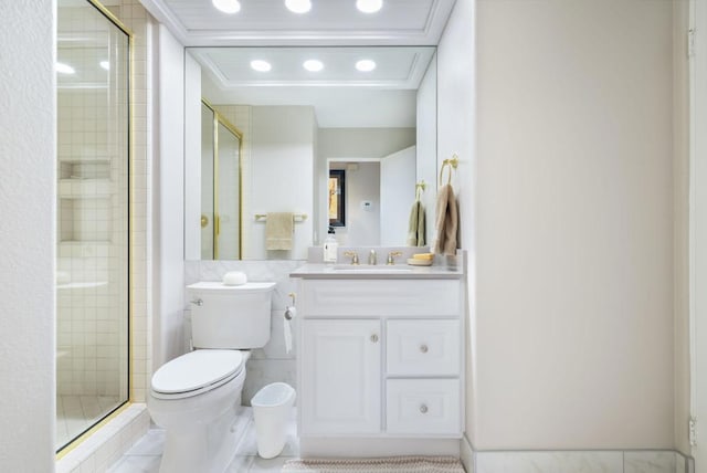 bathroom featuring vanity, tile patterned flooring, toilet, and walk in shower