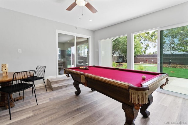 rec room with ceiling fan, light hardwood / wood-style floors, and billiards