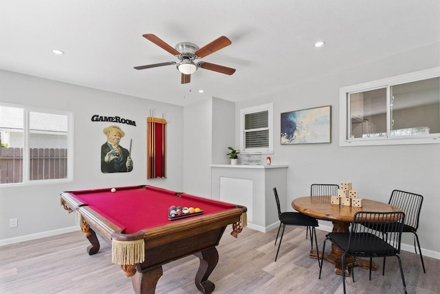 recreation room with pool table, light hardwood / wood-style floors, and ceiling fan