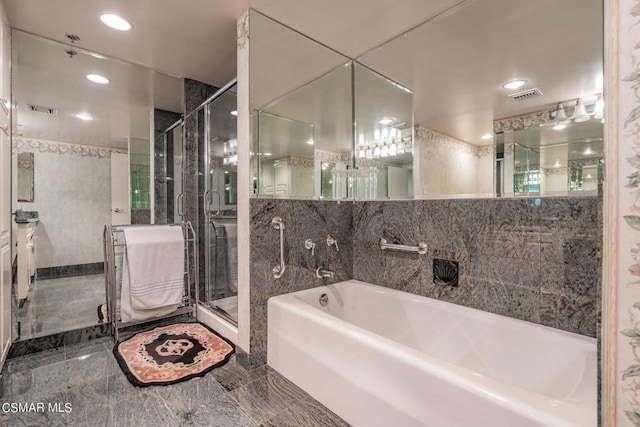 bathroom with plus walk in shower and tile walls