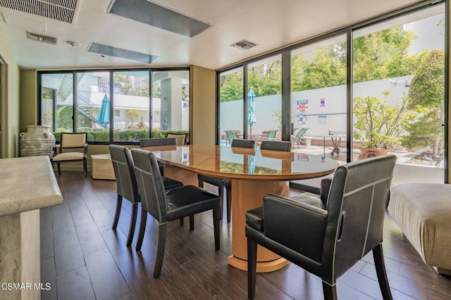 dining room featuring dark wood-type flooring