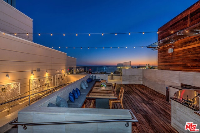 view of deck at dusk