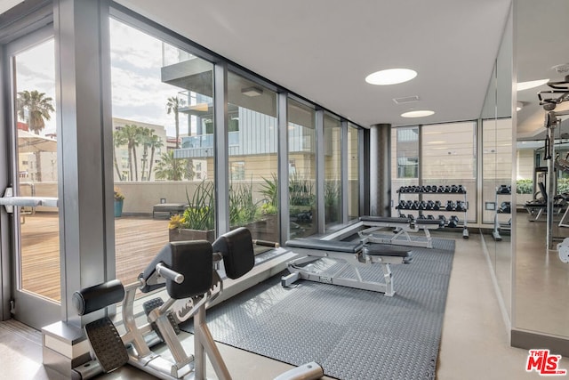 exercise room with a wall of windows