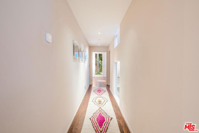 hallway featuring hardwood / wood-style floors