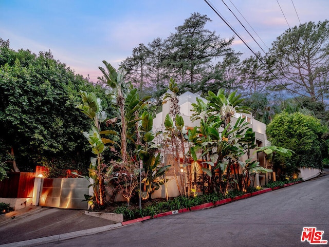 view of property exterior at dusk