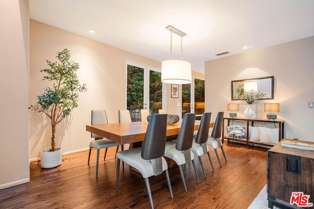 dining room featuring dark hardwood / wood-style floors