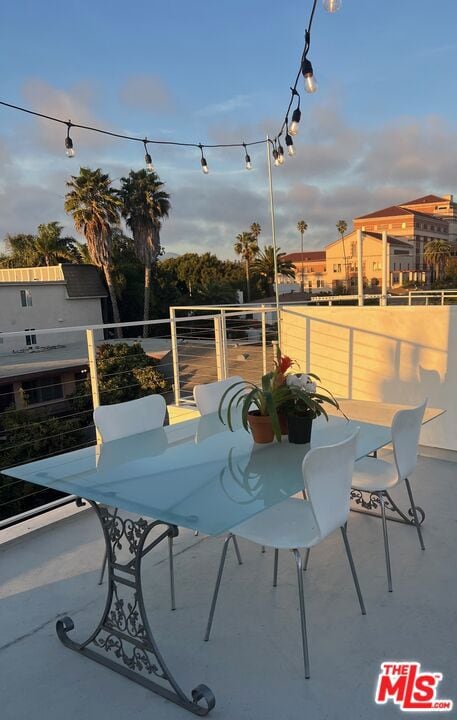 view of patio with a balcony