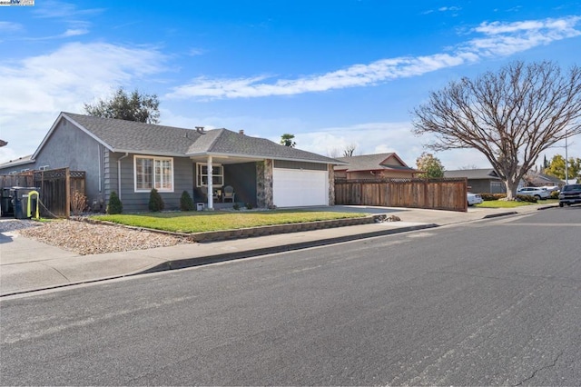 ranch-style home with a garage