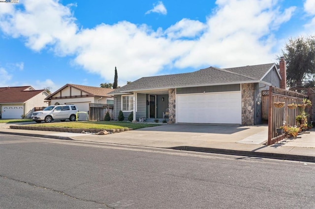 ranch-style home featuring a garage