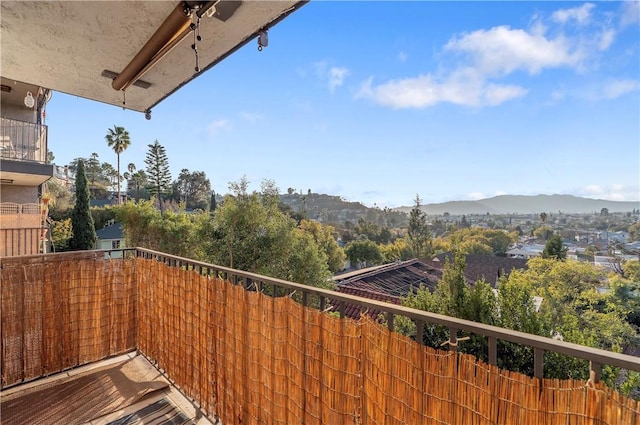 balcony featuring a mountain view