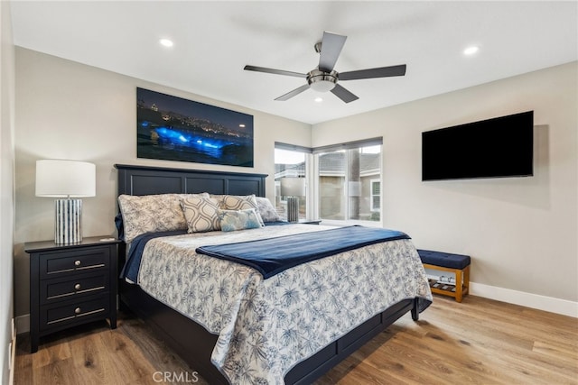 bedroom featuring hardwood / wood-style flooring and ceiling fan