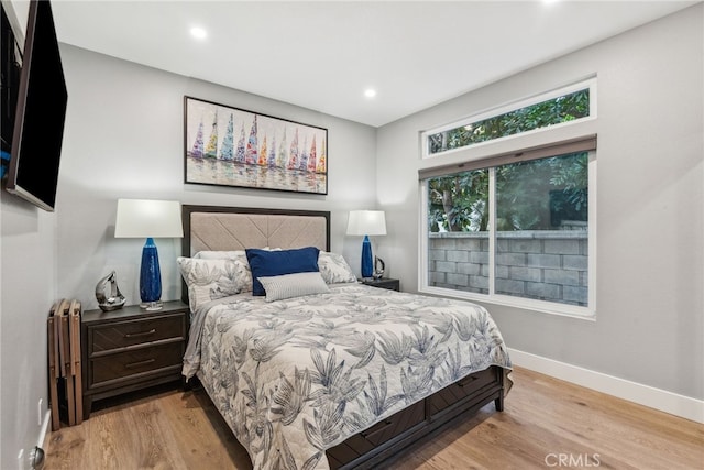 bedroom featuring light wood-type flooring