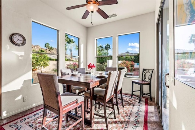 dining area with ceiling fan