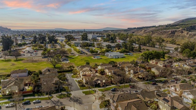 aerial view at dusk with a mountain view