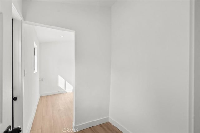 unfurnished room featuring light wood-type flooring